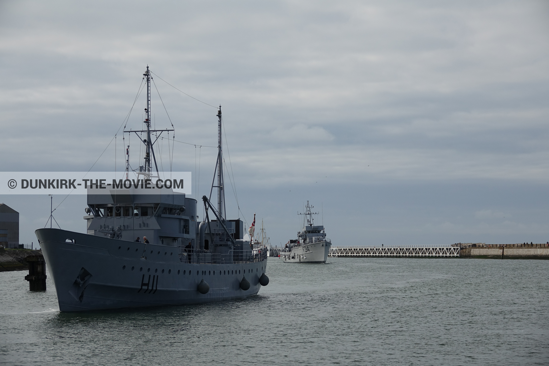 Picture with cloudy sky, F34 - Hr.Ms. Sittard, H11 - MLV Castor, EST pier, calm sea,  from behind the scene of the Dunkirk movie by Nolan