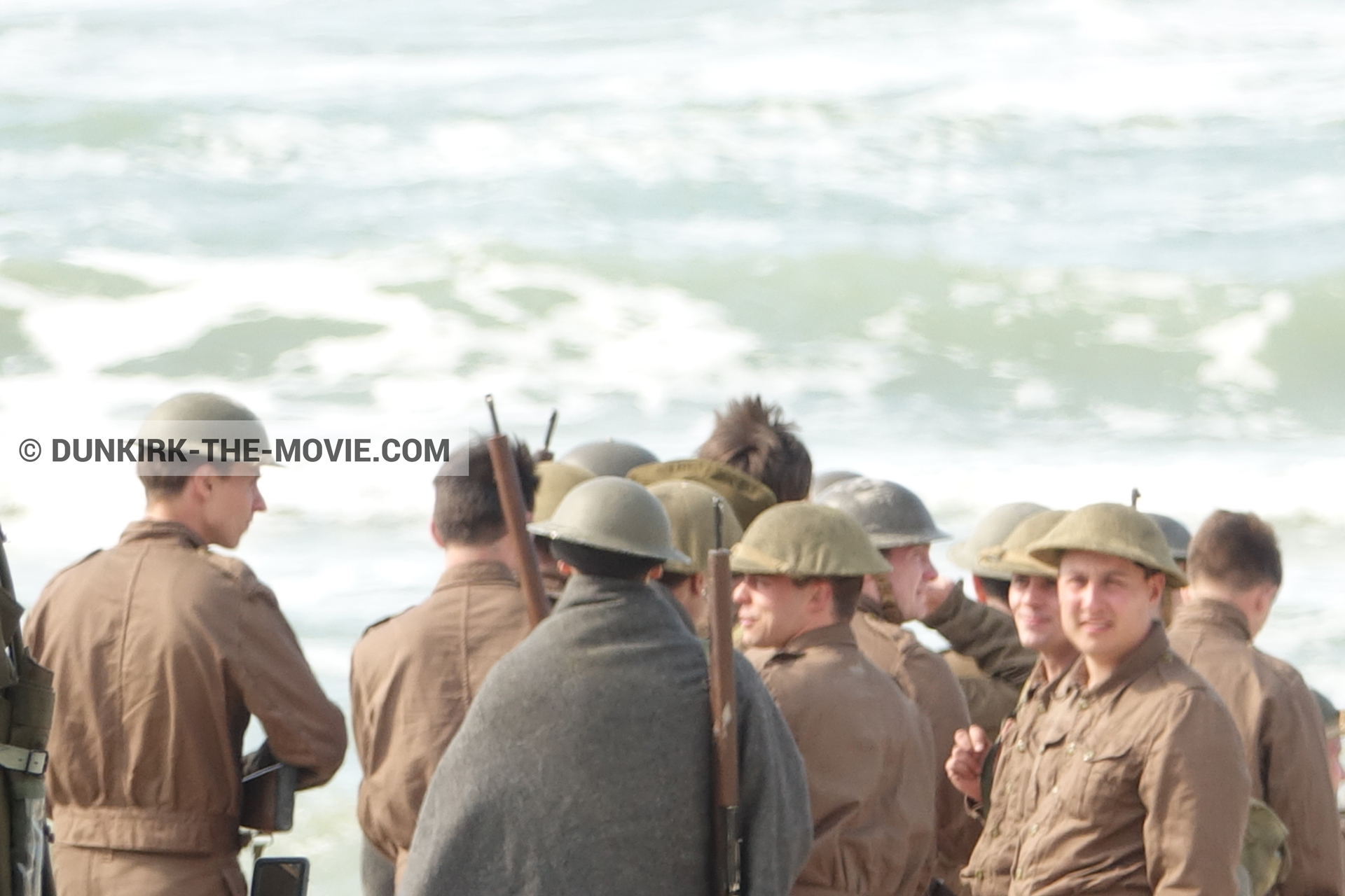 Picture with supernumeraries, rough sea,  from behind the scene of the Dunkirk movie by Nolan