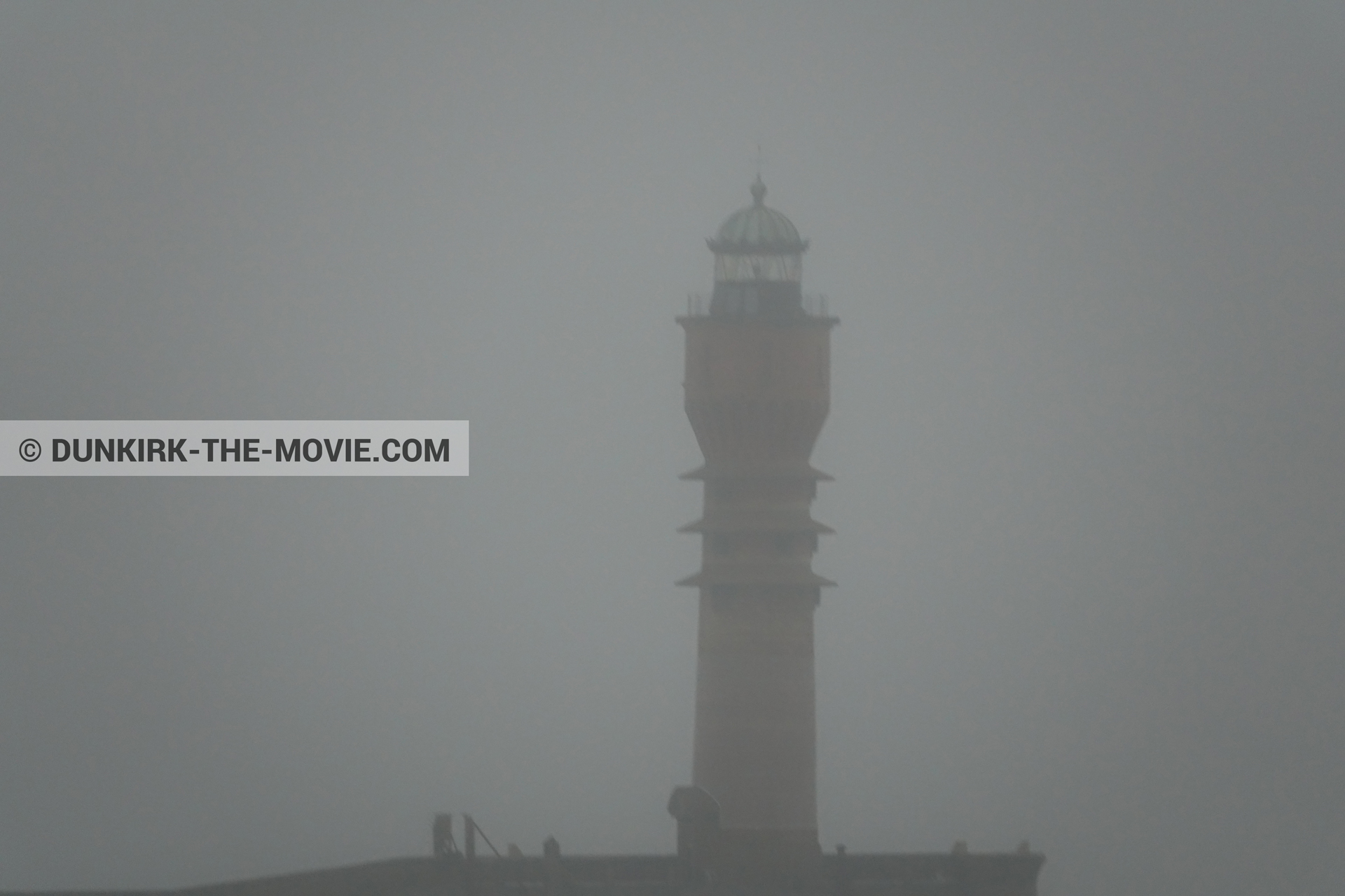 Picture with grey sky, rough sea, St Pol sur Mer lighthouse,  from behind the scene of the Dunkirk movie by Nolan