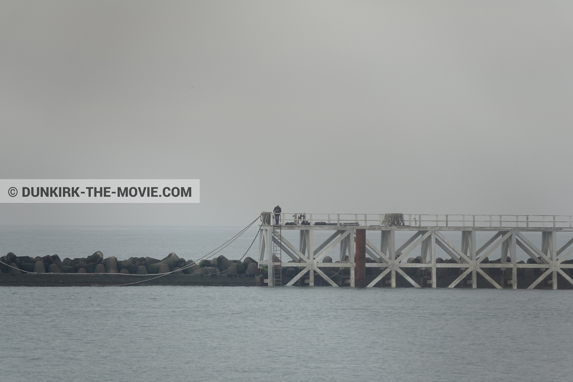 Picture with grey sky, EST pier, calm sea,  from behind the scene of the Dunkirk movie by Nolan