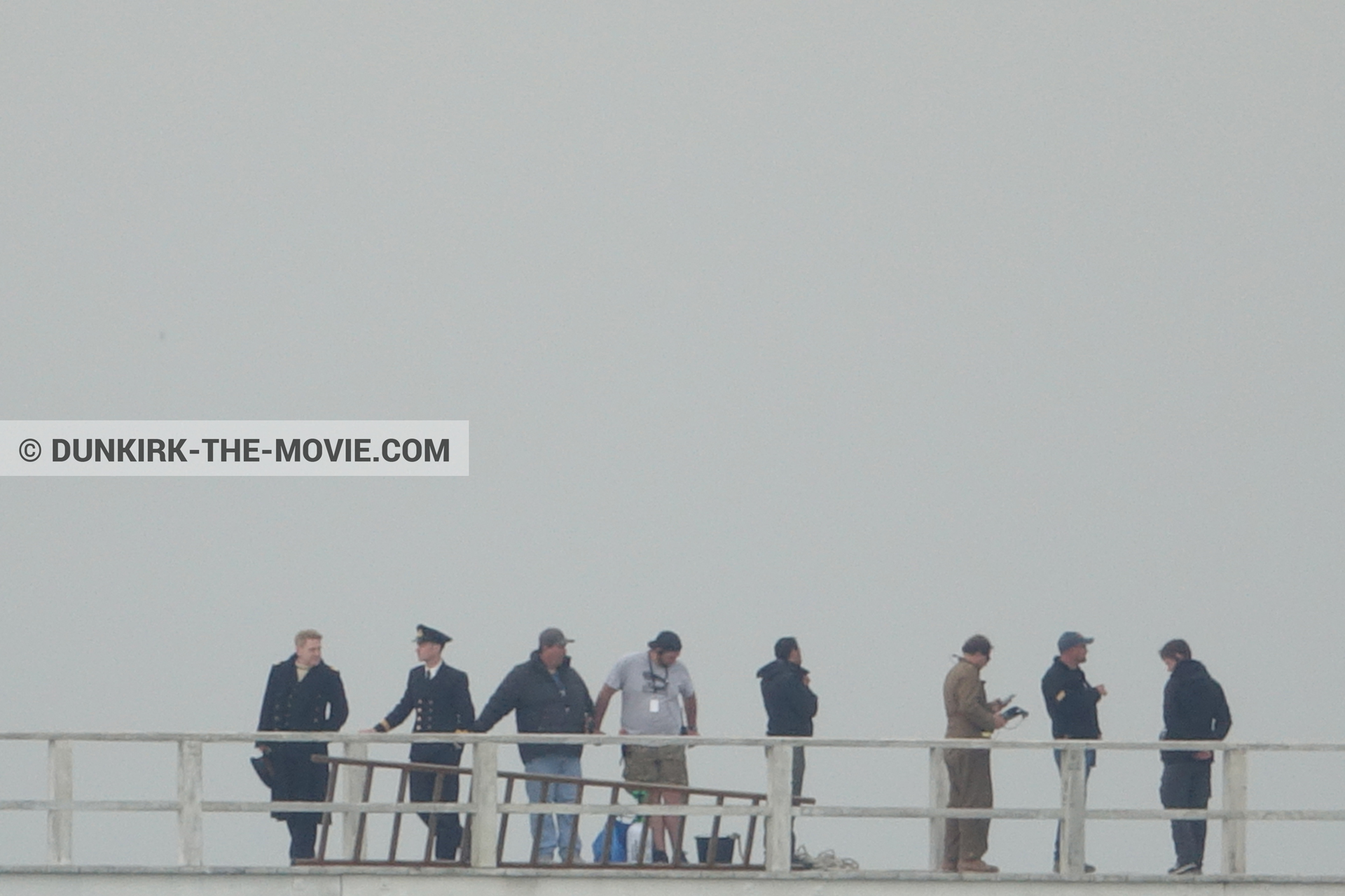 Picture with actor, grey sky, EST pier, Kenneth Branagh, technical team,  from behind the scene of the Dunkirk movie by Nolan