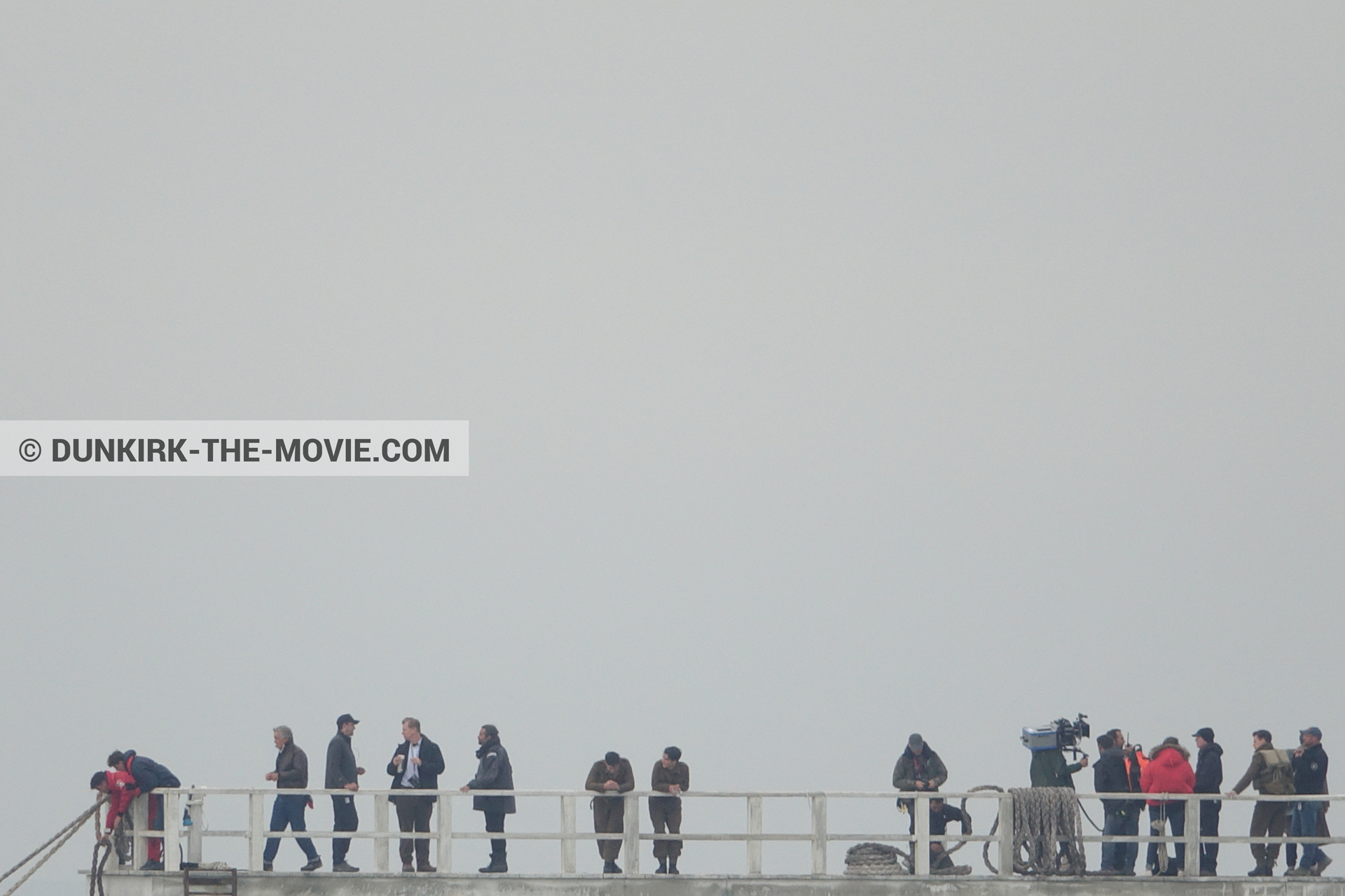 Picture with IMAX camera, grey sky, Hoyte van Hoytema, EST pier, Christopher Nolan, technical team, Nilo Otero,  from behind the scene of the Dunkirk movie by Nolan
