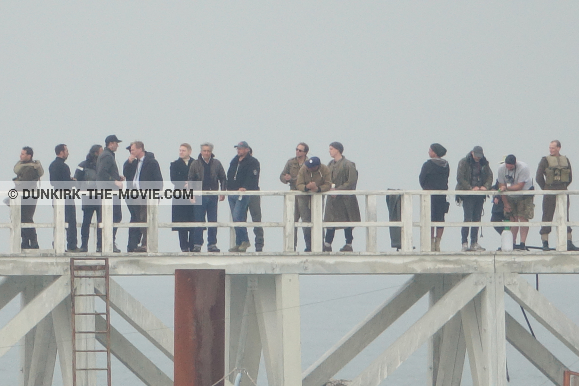 Picture with grey sky, supernumeraries, Hoyte van Hoytema, EST pier, Kenneth Branagh, Christopher Nolan, technical team, Nilo Otero,  from behind the scene of the Dunkirk movie by Nolan