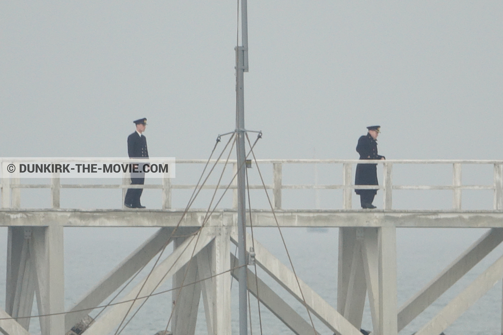 Picture with actor, grey sky, decor, EST pier, Kenneth Branagh,  from behind the scene of the Dunkirk movie by Nolan