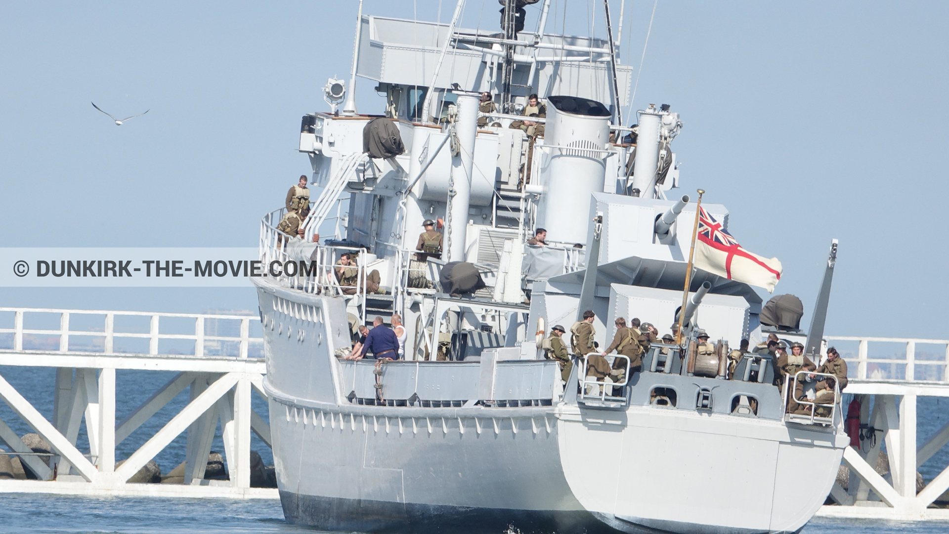 Picture with blue sky, supernumeraries, H32 - Hr.Ms. Sittard, EST pier, calm sea,  from behind the scene of the Dunkirk movie by Nolan