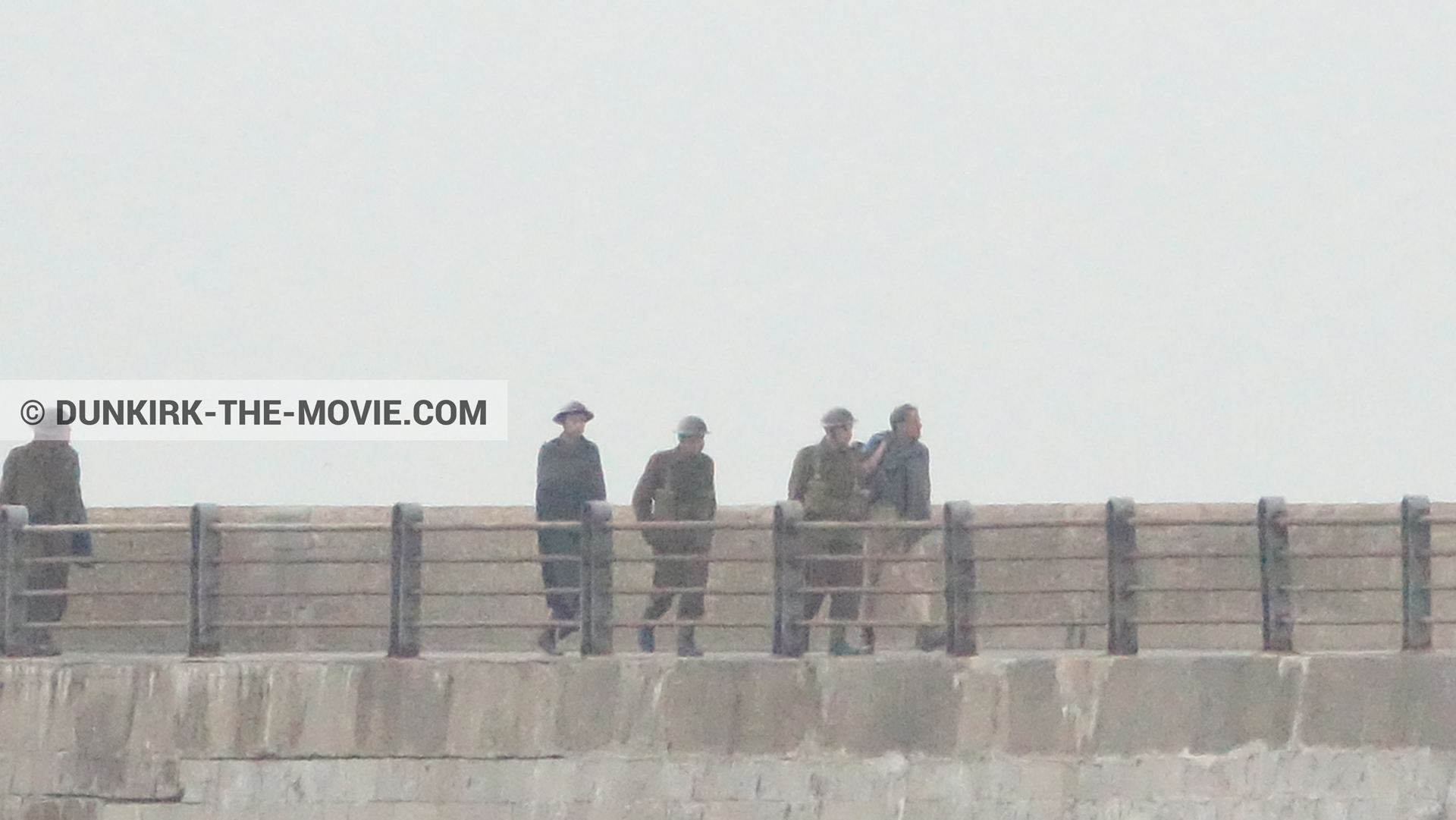 Picture with grey sky, supernumeraries, EST pier,  from behind the scene of the Dunkirk movie by Nolan