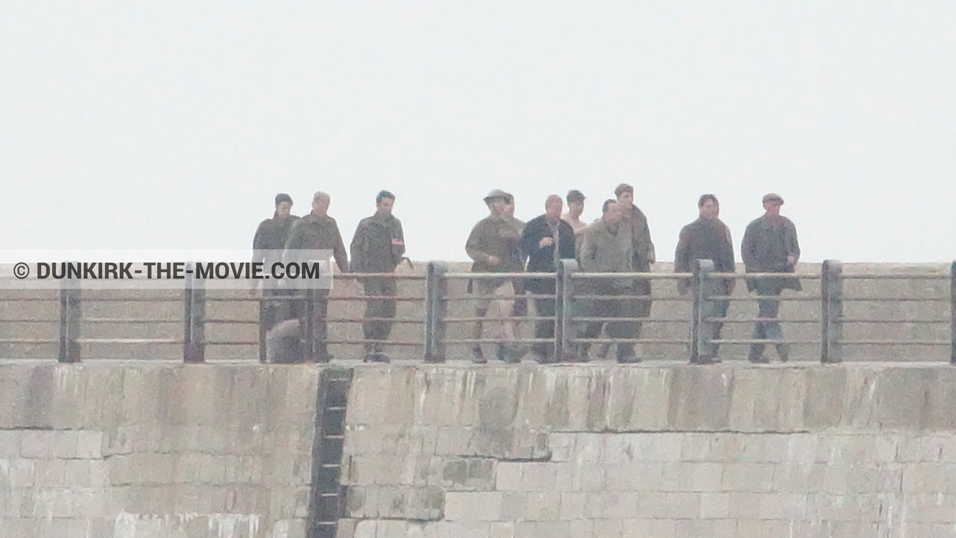 Picture with grey sky, supernumeraries, EST pier,  from behind the scene of the Dunkirk movie by Nolan