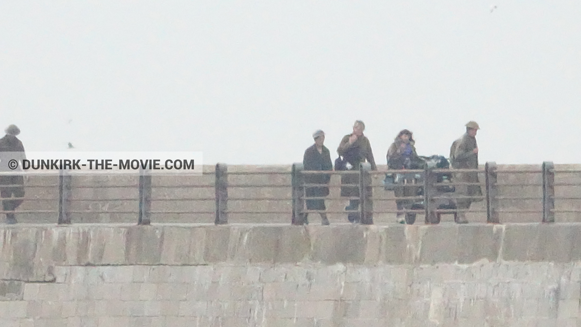 Picture with grey sky, supernumeraries, EST pier,  from behind the scene of the Dunkirk movie by Nolan