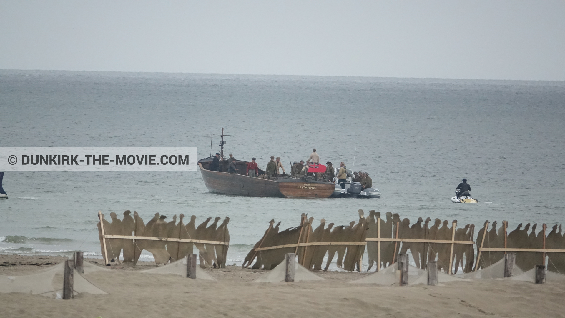 Picture with boat, decor, beach,  from behind the scene of the Dunkirk movie by Nolan