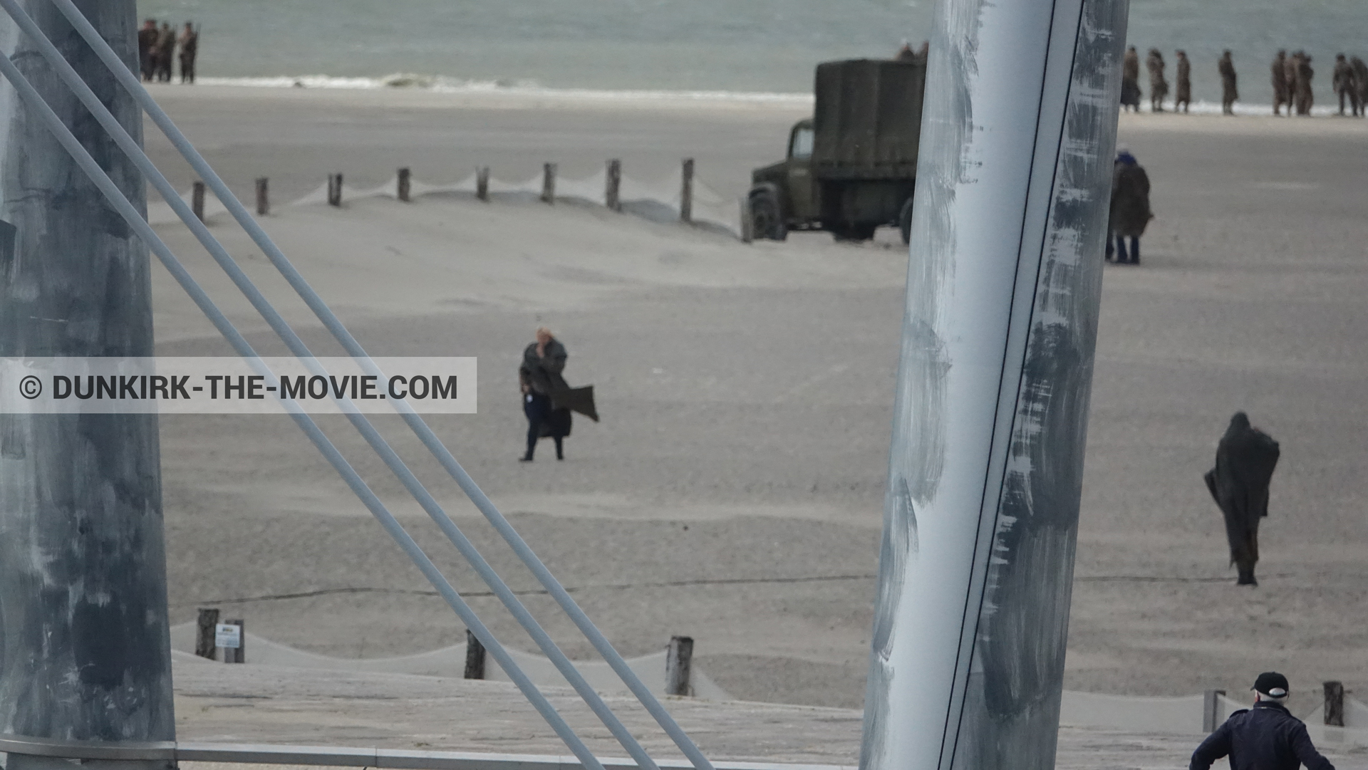 Picture with truck, supernumeraries, beach,  from behind the scene of the Dunkirk movie by Nolan