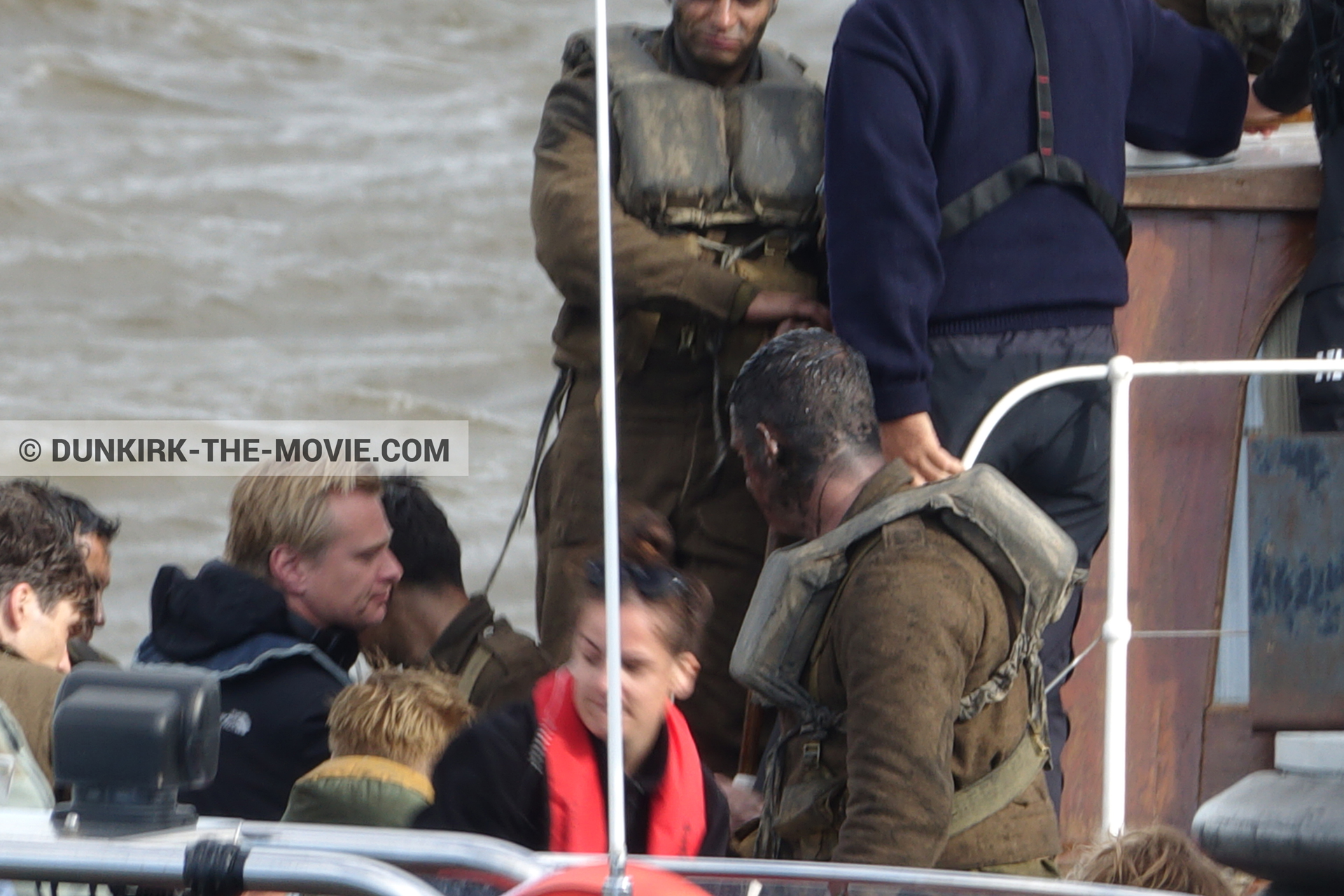 Picture with supernumeraries, technical team,  from behind the scene of the Dunkirk movie by Nolan
