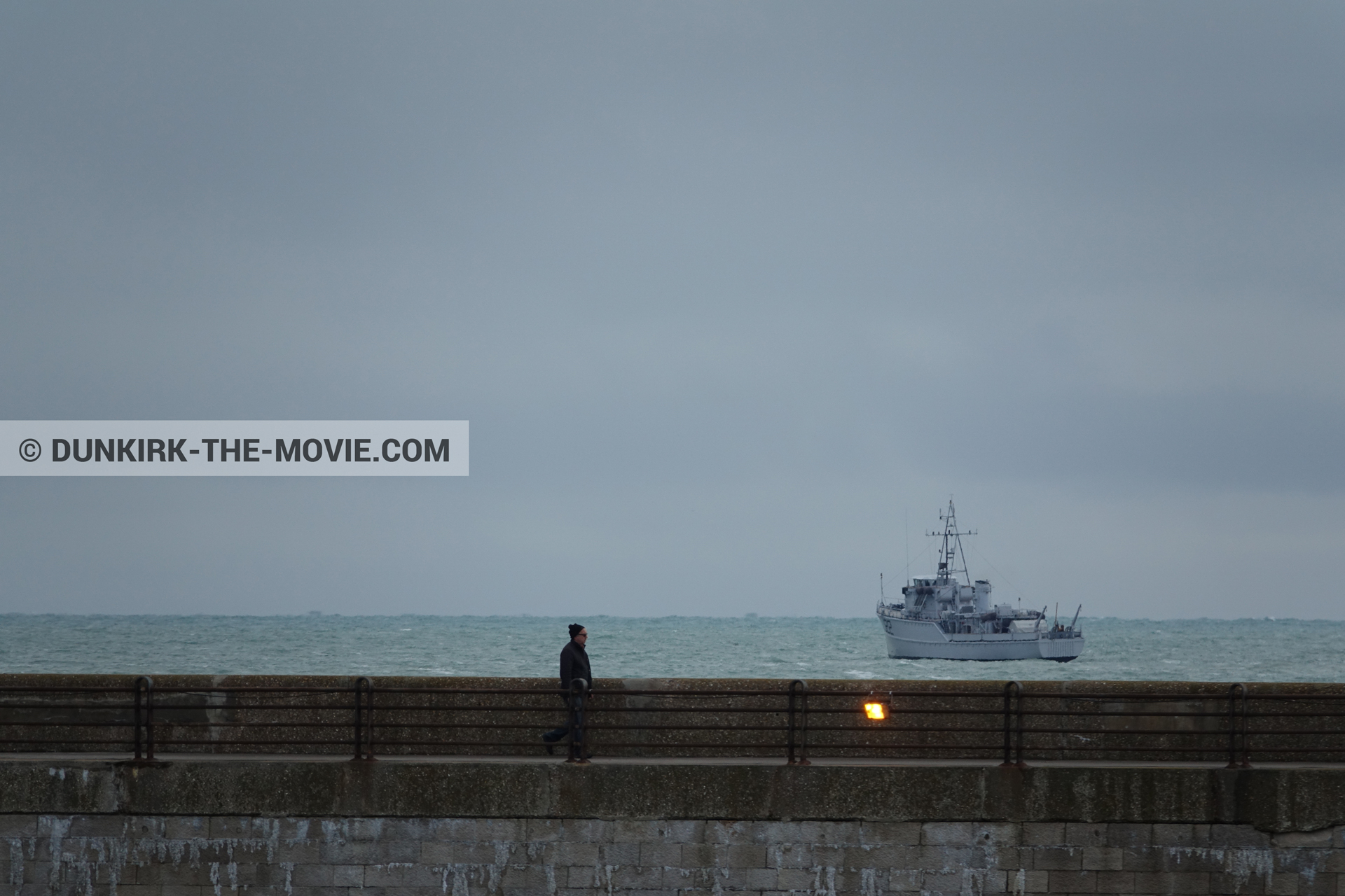 Picture with boat, grey sky, EST pier,  from behind the scene of the Dunkirk movie by Nolan