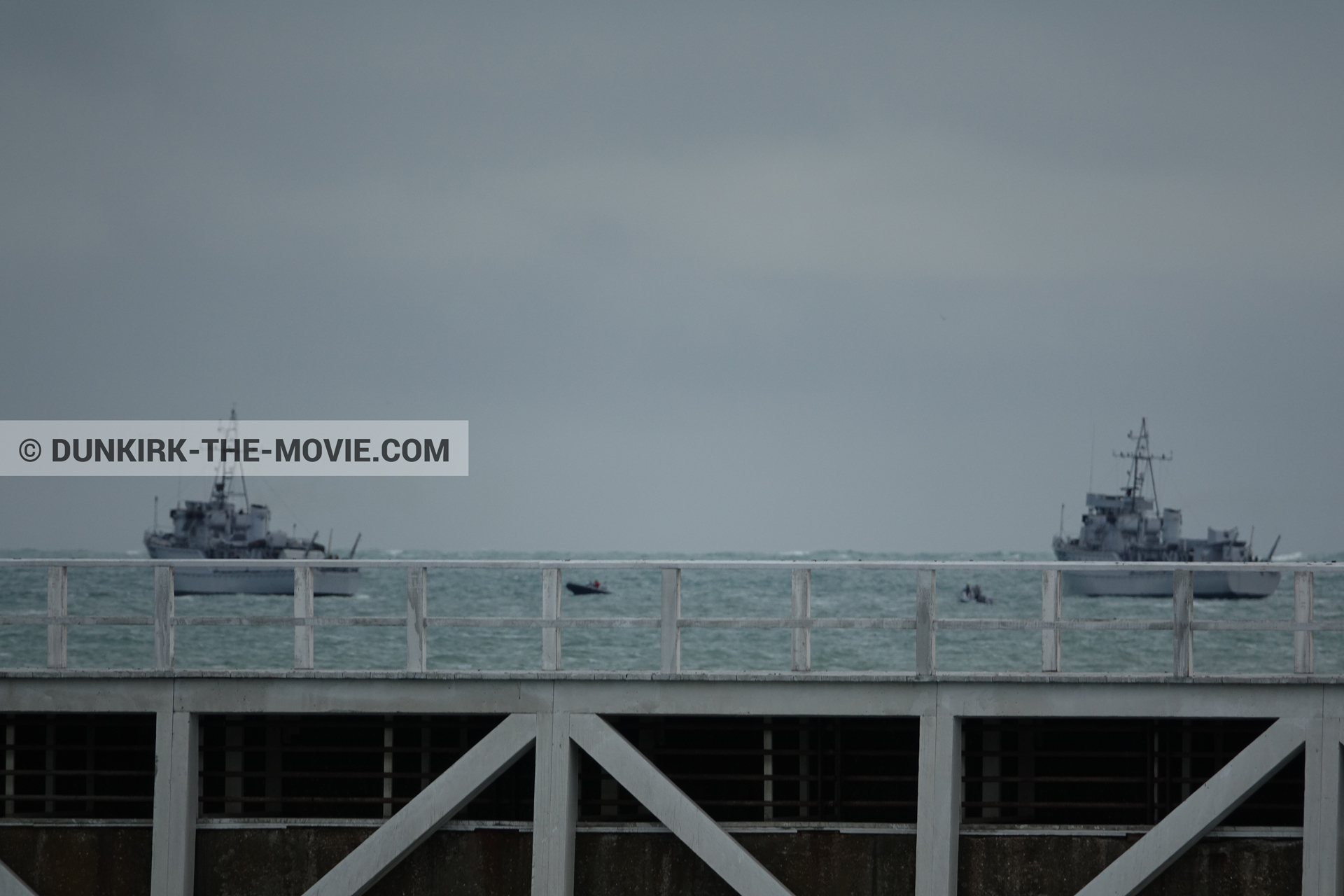 Picture with boat, grey sky, EST pier,  from behind the scene of the Dunkirk movie by Nolan