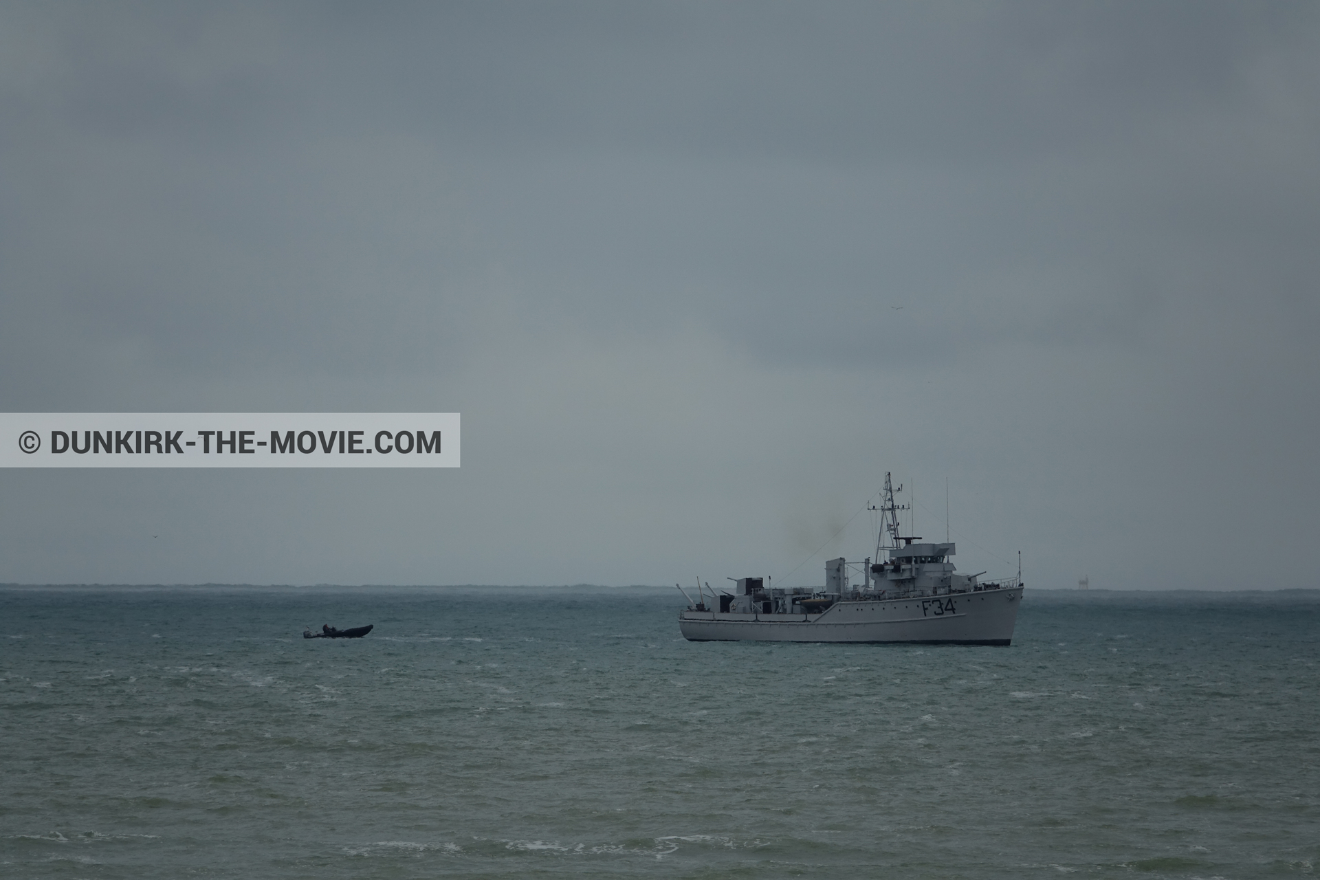 Picture with boat, grey sky, F34 - Hr.Ms. Sittard, calm sea,  from behind the scene of the Dunkirk movie by Nolan
