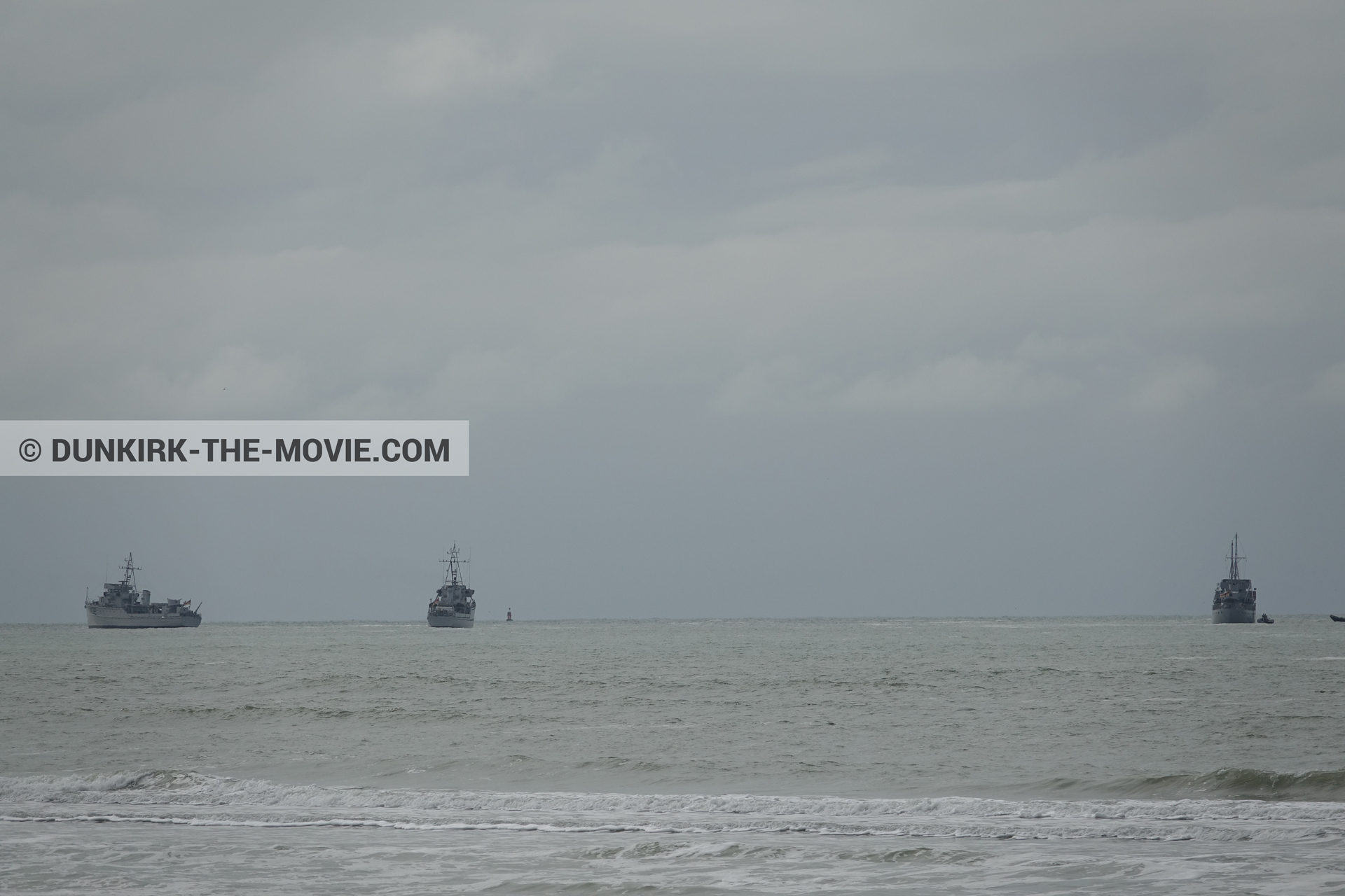 Picture with boat, cloudy sky,  from behind the scene of the Dunkirk movie by Nolan