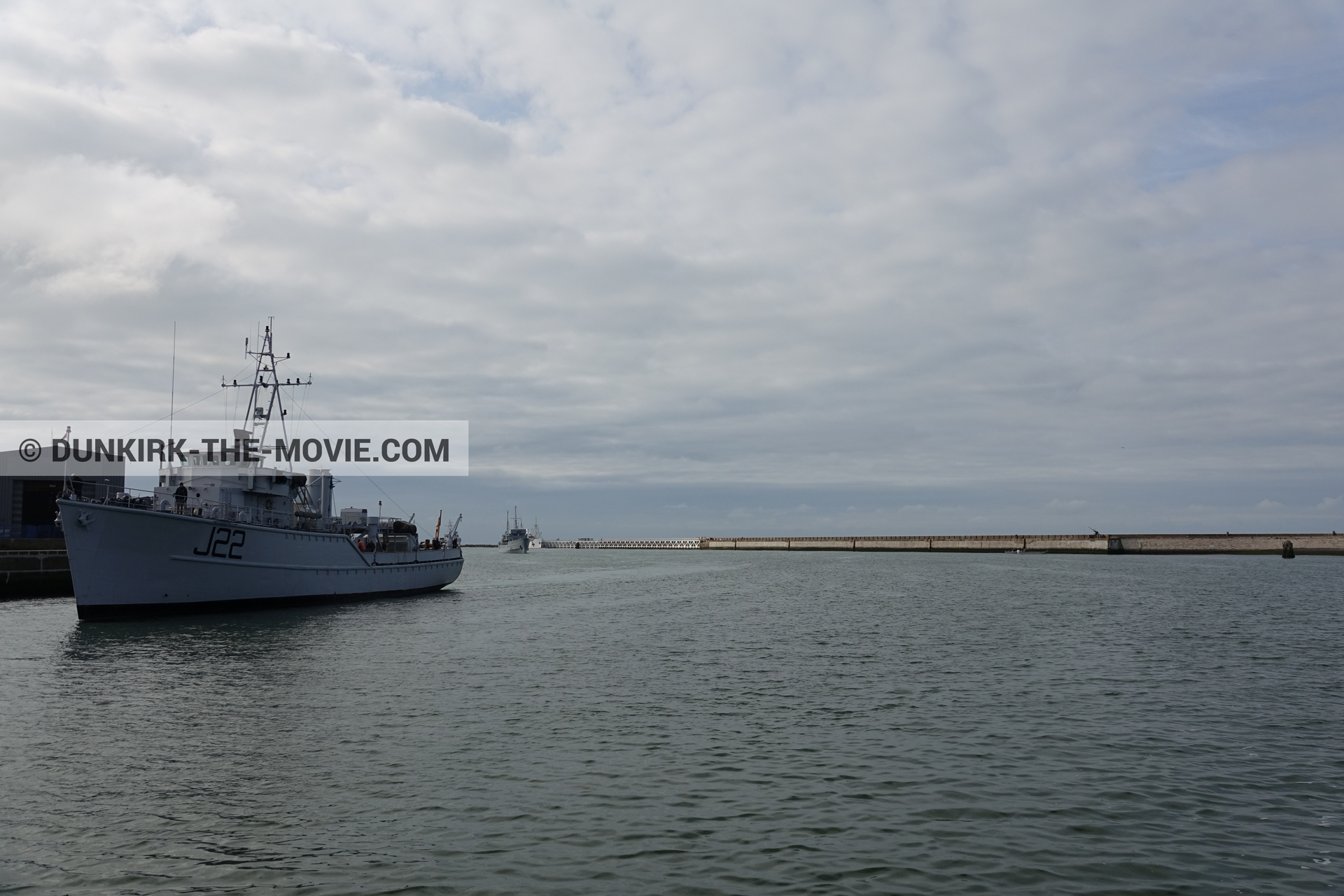 Picture with cloudy sky, J22 -Hr.Ms. Naaldwijk, EST pier, calm sea,  from behind the scene of the Dunkirk movie by Nolan