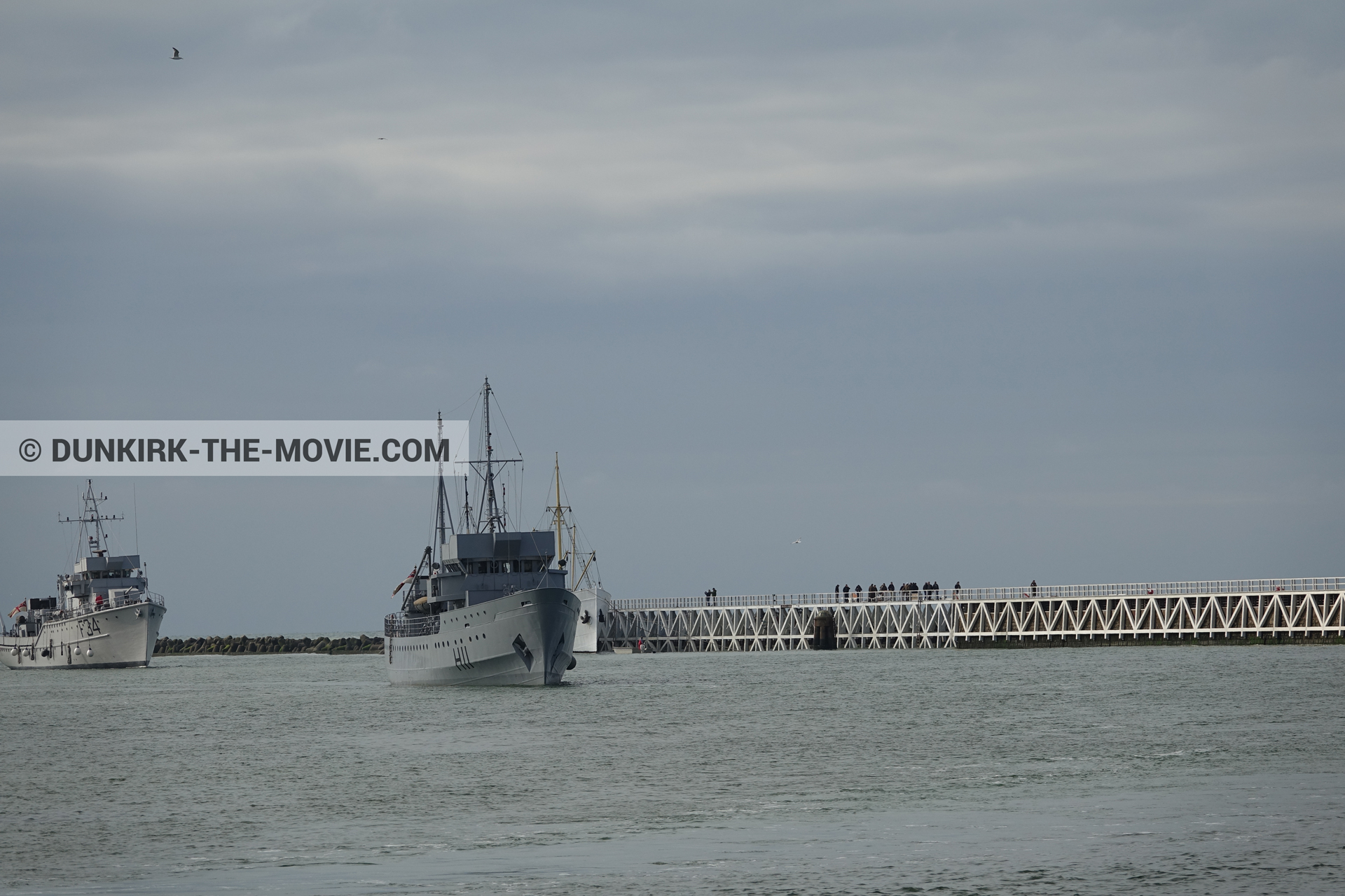 Picture with cloudy sky, F34 - Hr.Ms. Sittard, H11 - MLV Castor, EST pier, calm sea,  from behind the scene of the Dunkirk movie by Nolan