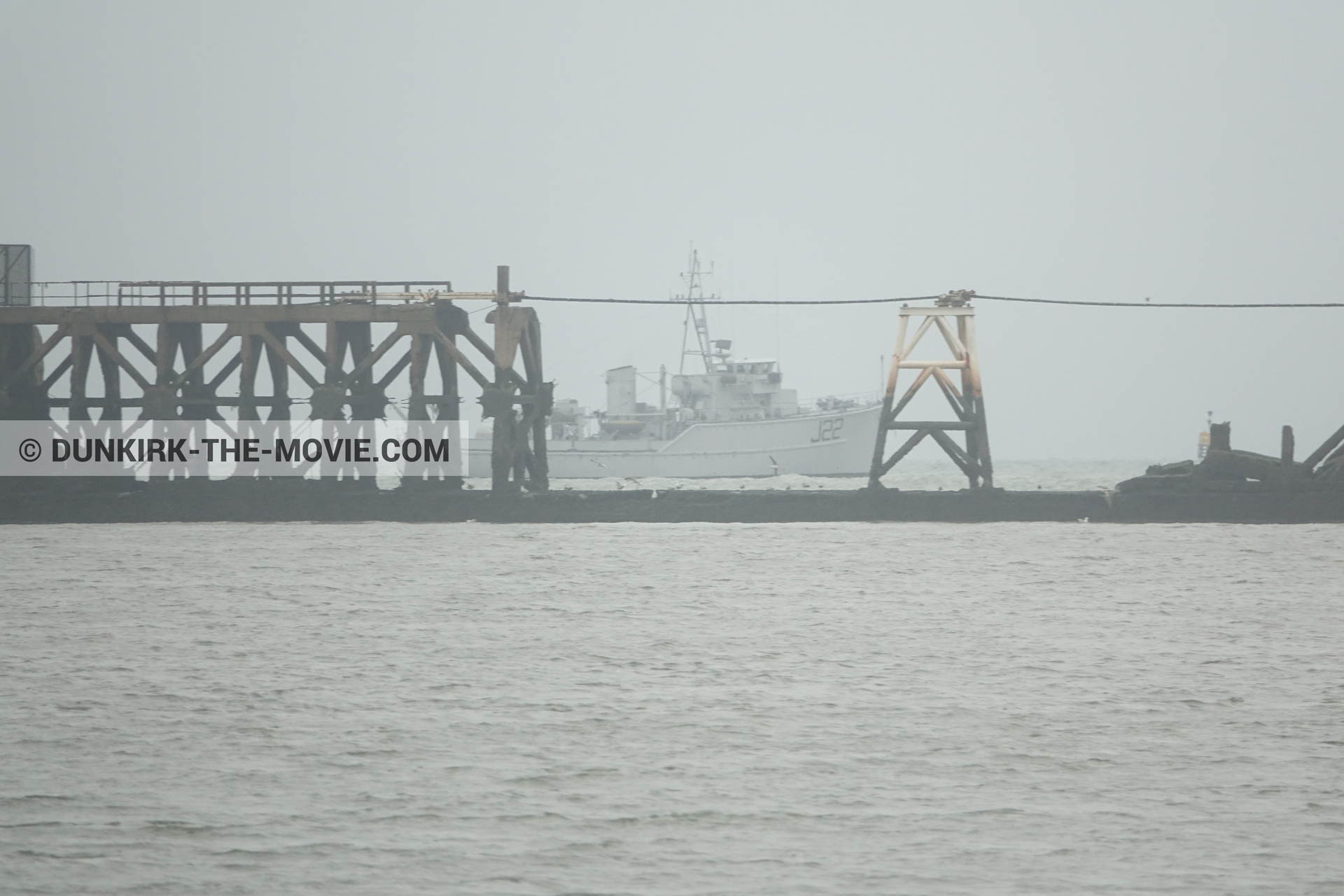 Picture with grey sky, J22 -Hr.Ms. Naaldwijk, calm sea,  from behind the scene of the Dunkirk movie by Nolan