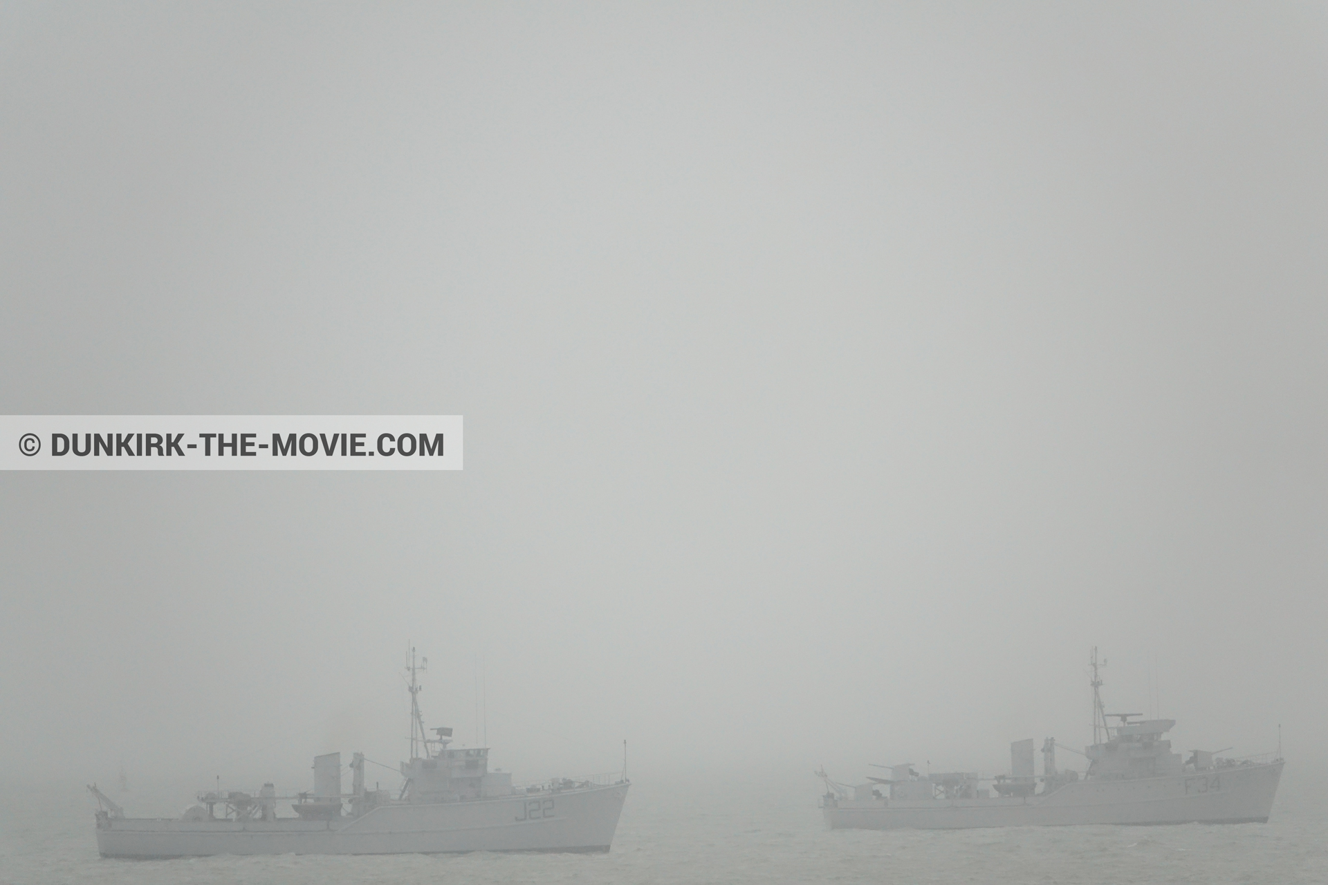 Picture with grey sky, F34 - Hr.Ms. Sittard, J22 -Hr.Ms. Naaldwijk, calm sea,  from behind the scene of the Dunkirk movie by Nolan