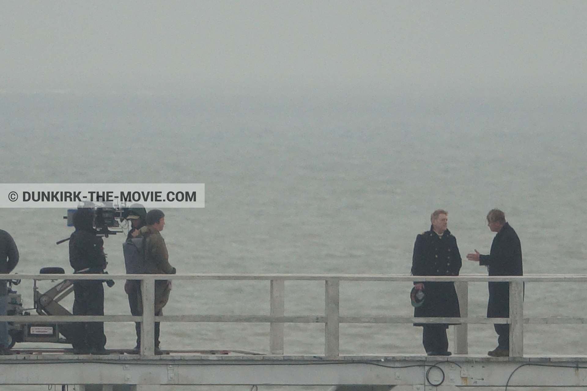 Picture with grey sky, EST pier, Kenneth Branagh, Christopher Nolan, technical team,  from behind the scene of the Dunkirk movie by Nolan