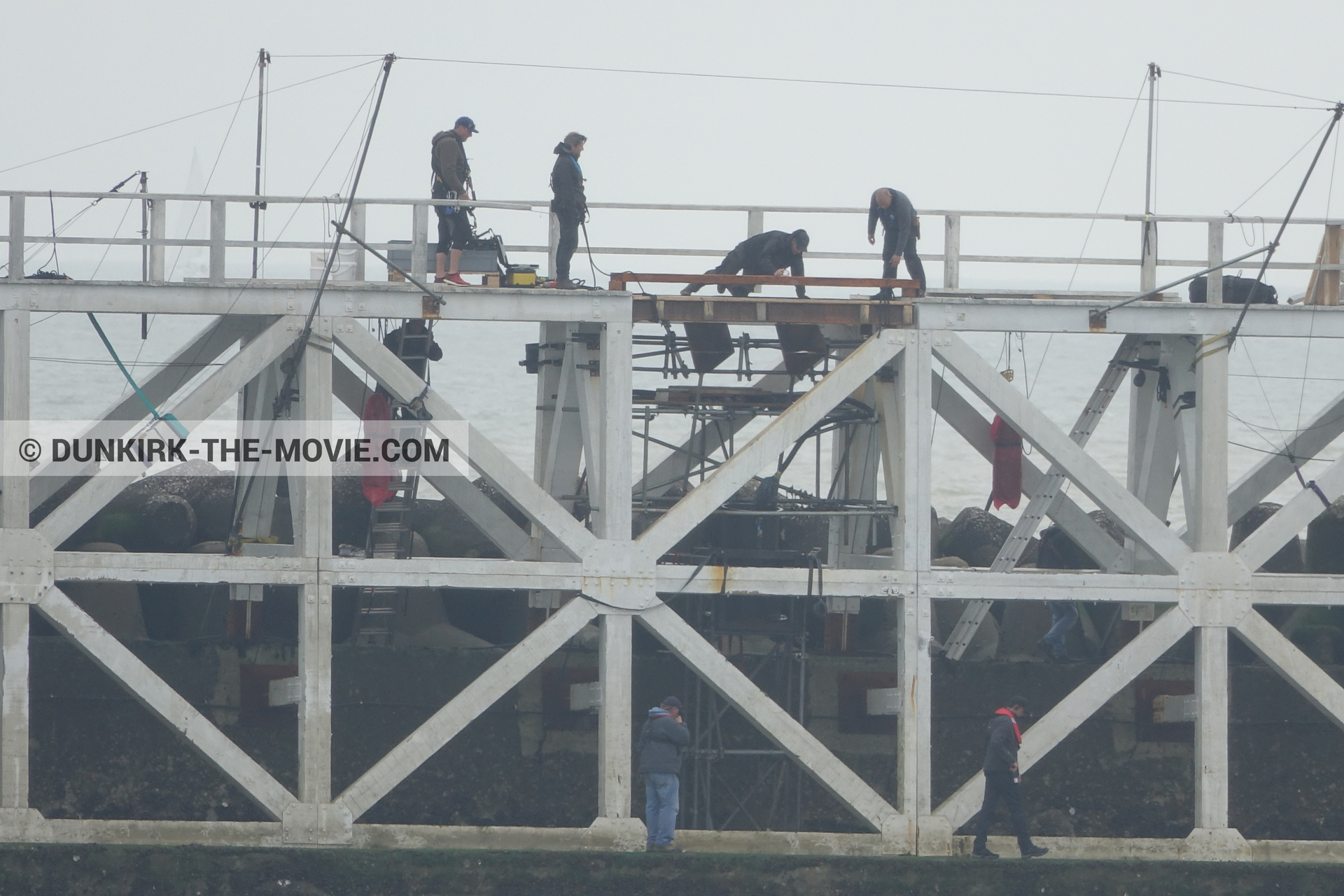 Picture with grey sky, EST pier, technical team,  from behind the scene of the Dunkirk movie by Nolan