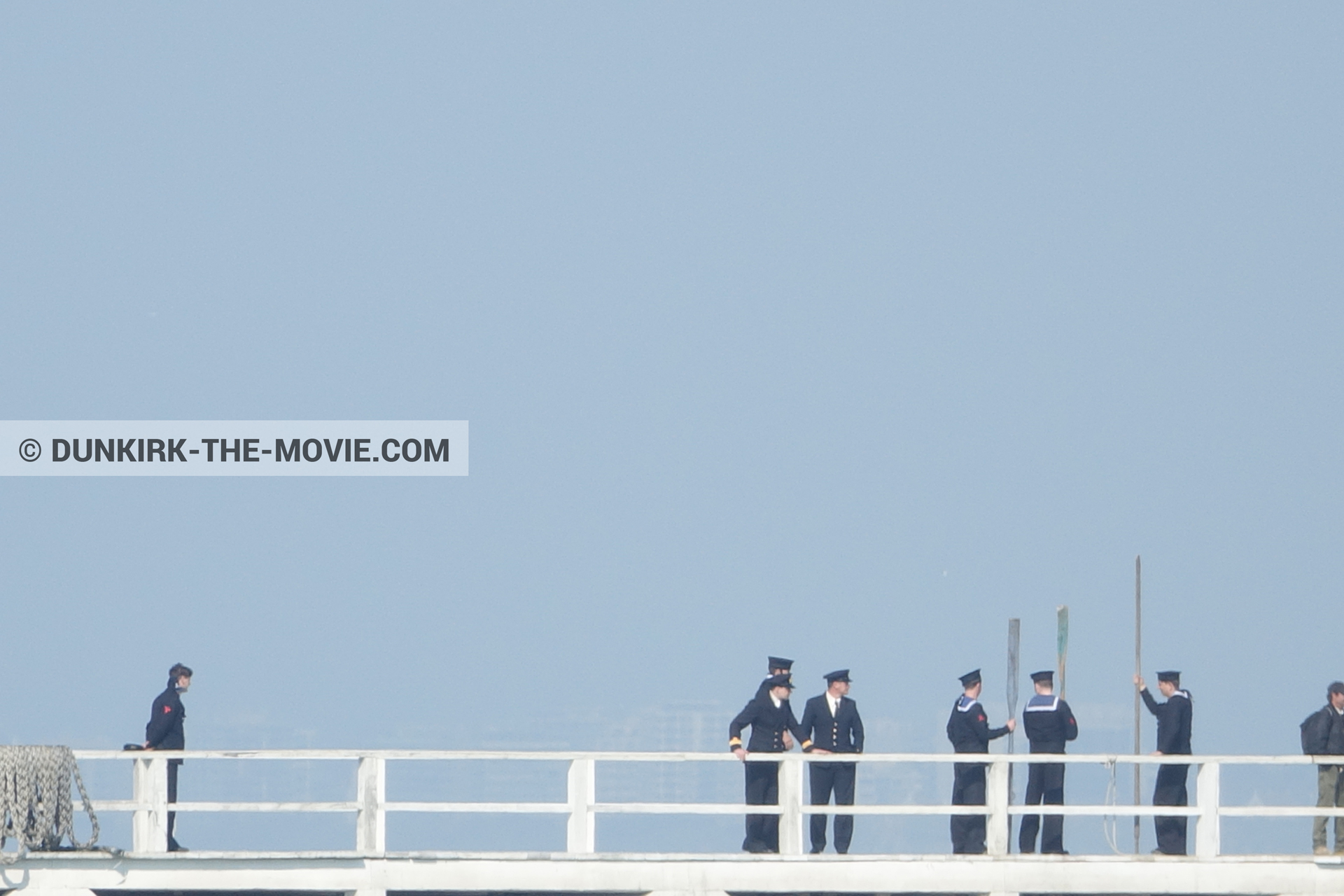Picture with blue sky, supernumeraries, EST pier, technical team,  from behind the scene of the Dunkirk movie by Nolan