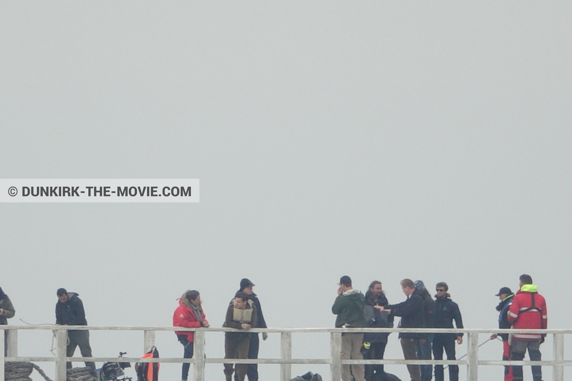 Picture with actor, grey sky, Hoyte van Hoytema, EST pier, Christopher Nolan, technical team,  from behind the scene of the Dunkirk movie by Nolan