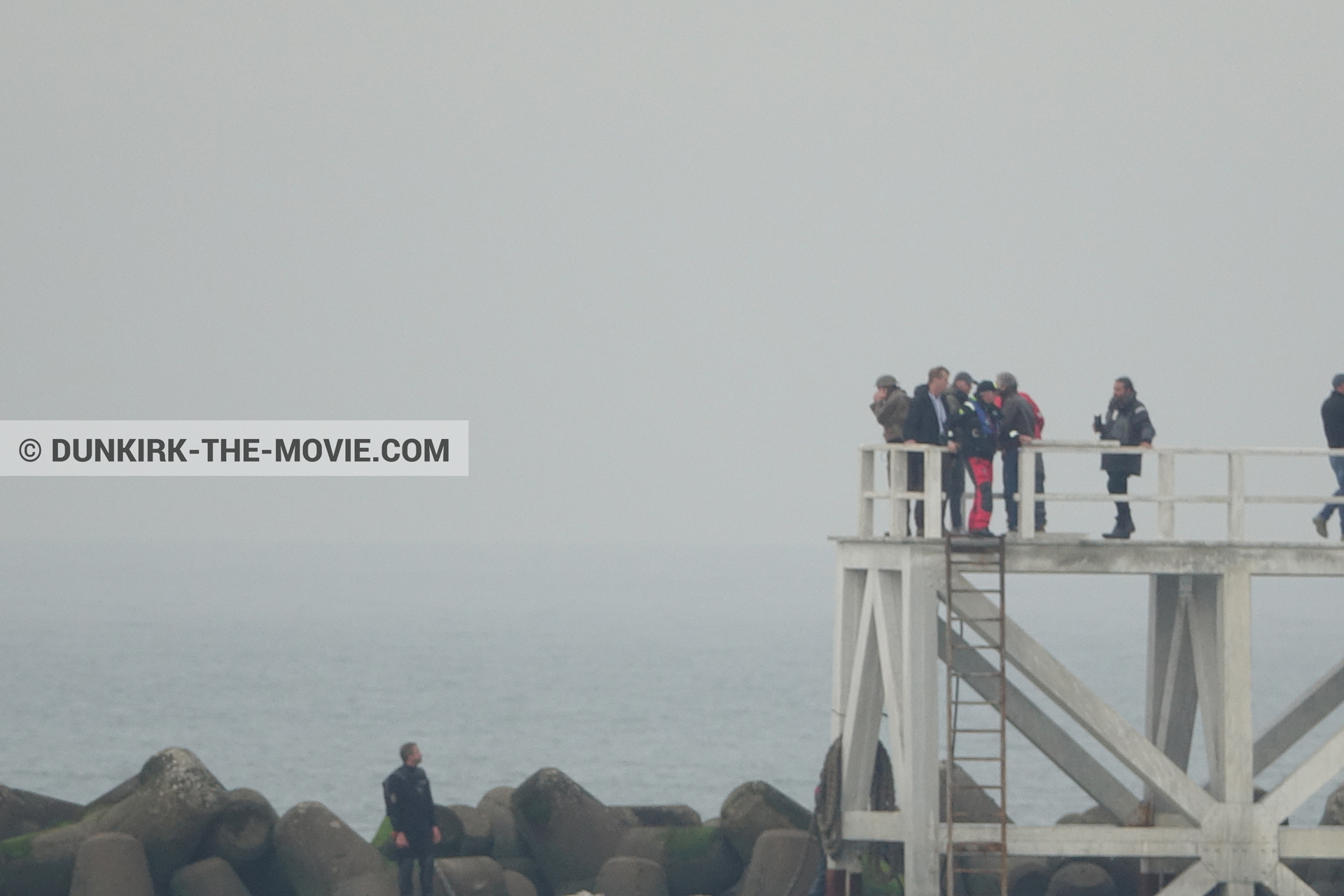 Picture with actor, grey sky, Hoyte van Hoytema, EST pier, Christopher Nolan, Nilo Otero,  from behind the scene of the Dunkirk movie by Nolan