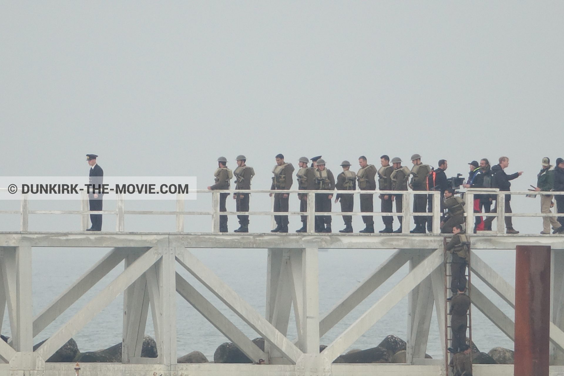 Picture with actor, grey sky, supernumeraries, Hoyte van Hoytema, EST pier, Christopher Nolan,  from behind the scene of the Dunkirk movie by Nolan