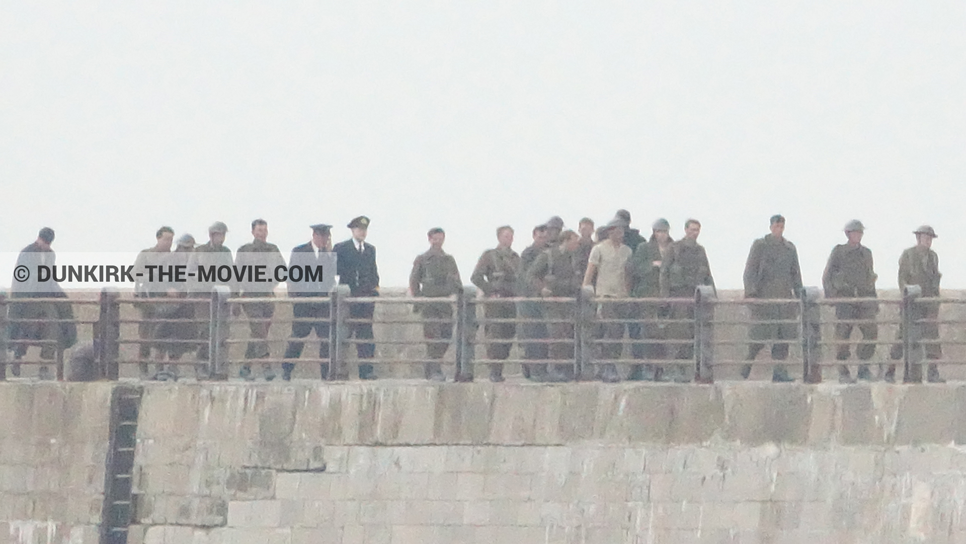 Picture with actor, grey sky, supernumeraries, EST pier, Kenneth Branagh,  from behind the scene of the Dunkirk movie by Nolan