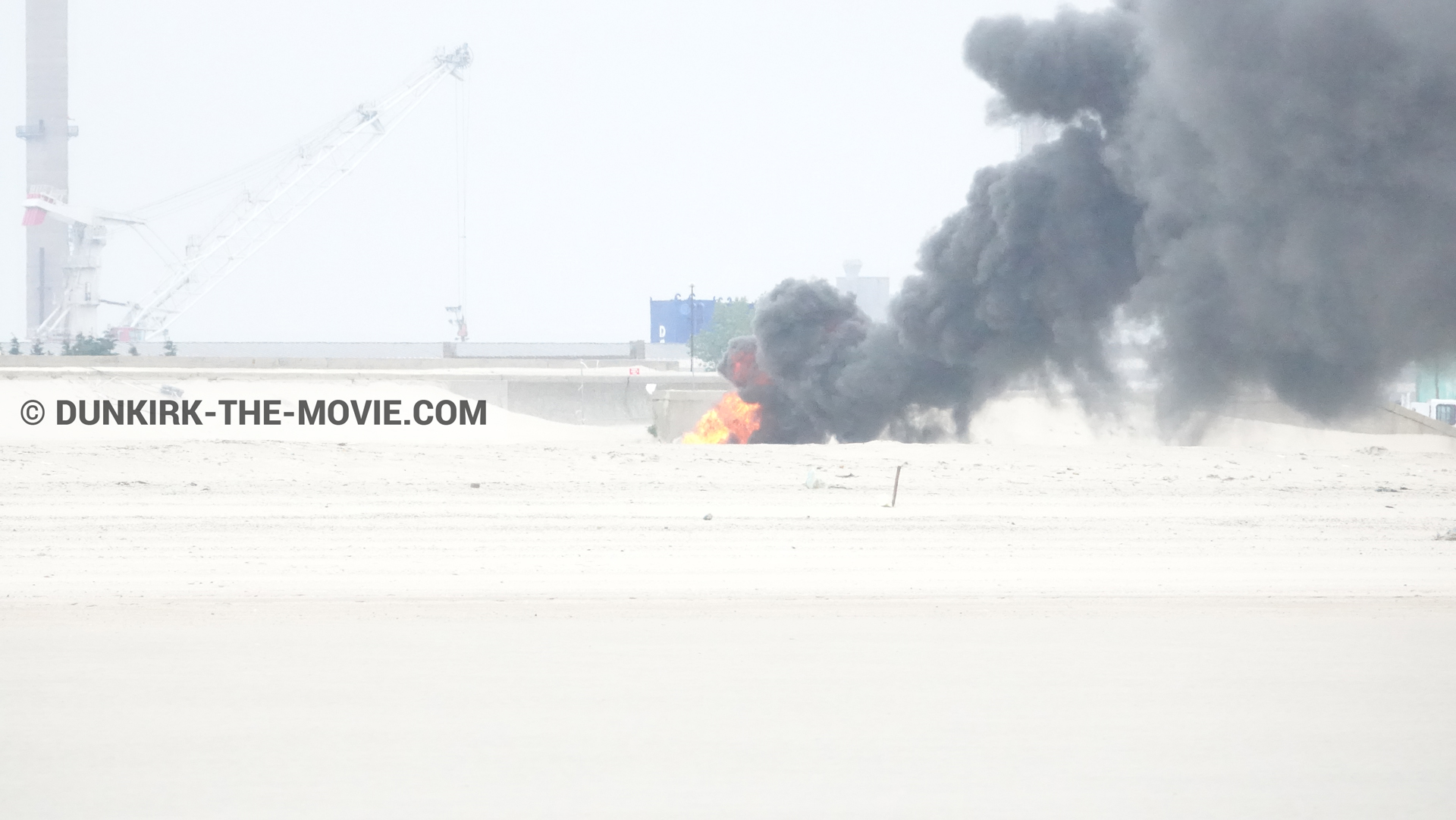 Picture with black smoke, beach,  from behind the scene of the Dunkirk movie by Nolan