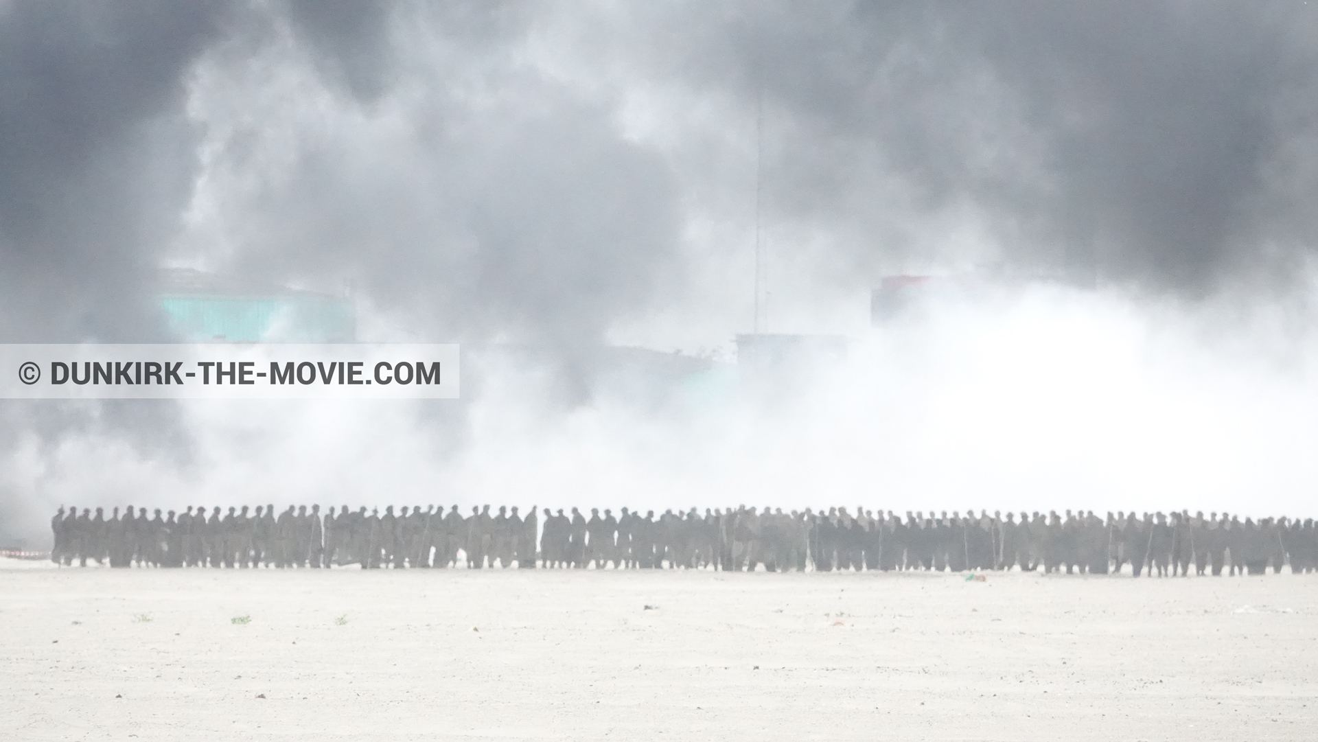 Picture with decor, black smoke, beach,  from behind the scene of the Dunkirk movie by Nolan