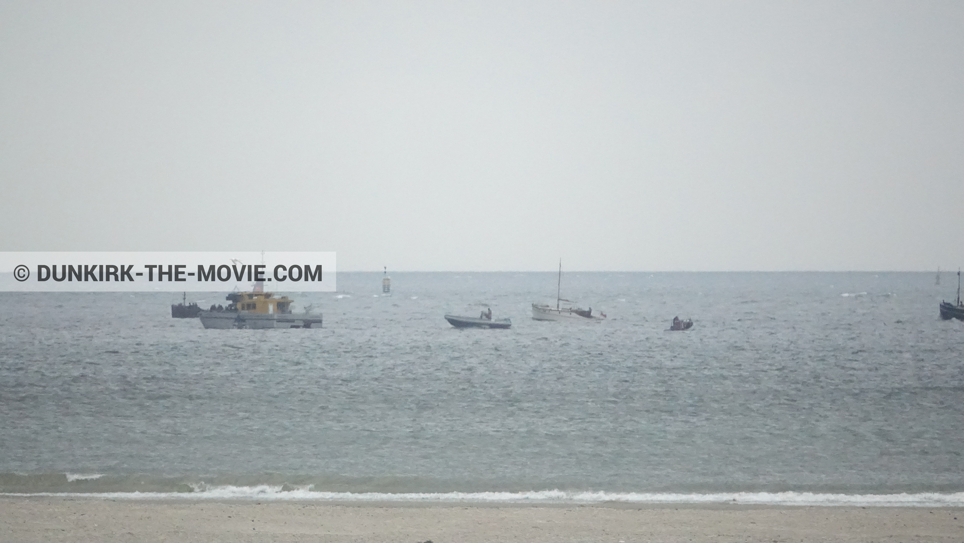 Picture with boat, grey sky, Ocean Wind 4, beach,  from behind the scene of the Dunkirk movie by Nolan