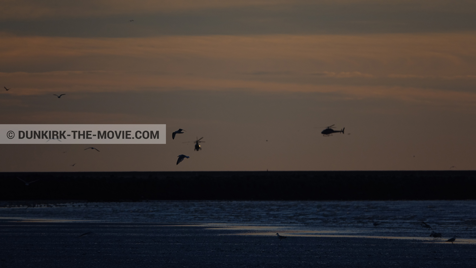 Fotos con cielo anaranjado, cámara helicóptero,  durante el rodaje de la película Dunkerque de Nolan